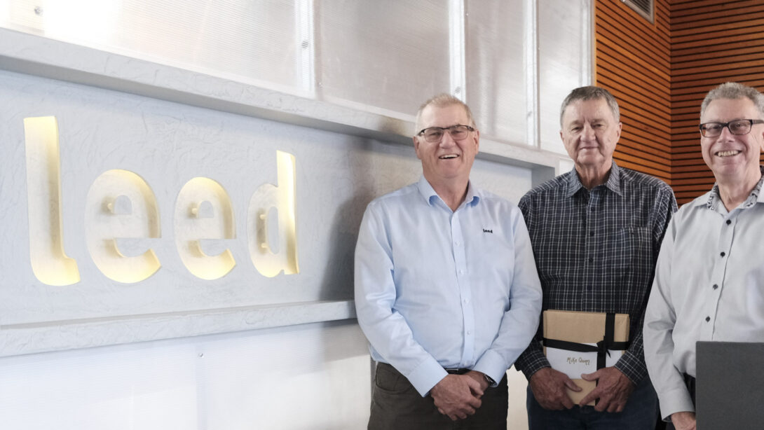 Leed - Leed MD Craig Laslett, General Manager-Plant Mike Quinn and Chair Andrew Millar are pictured with a Leed sign to their right.
